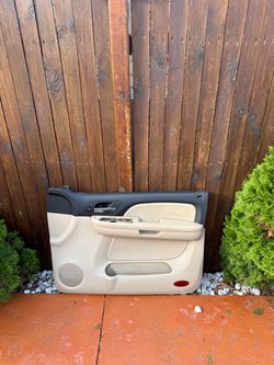 Door panels with door handles off a suburban