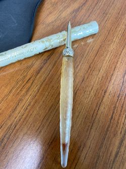 Vintage Avon scent with love calipraghy perfume bottle