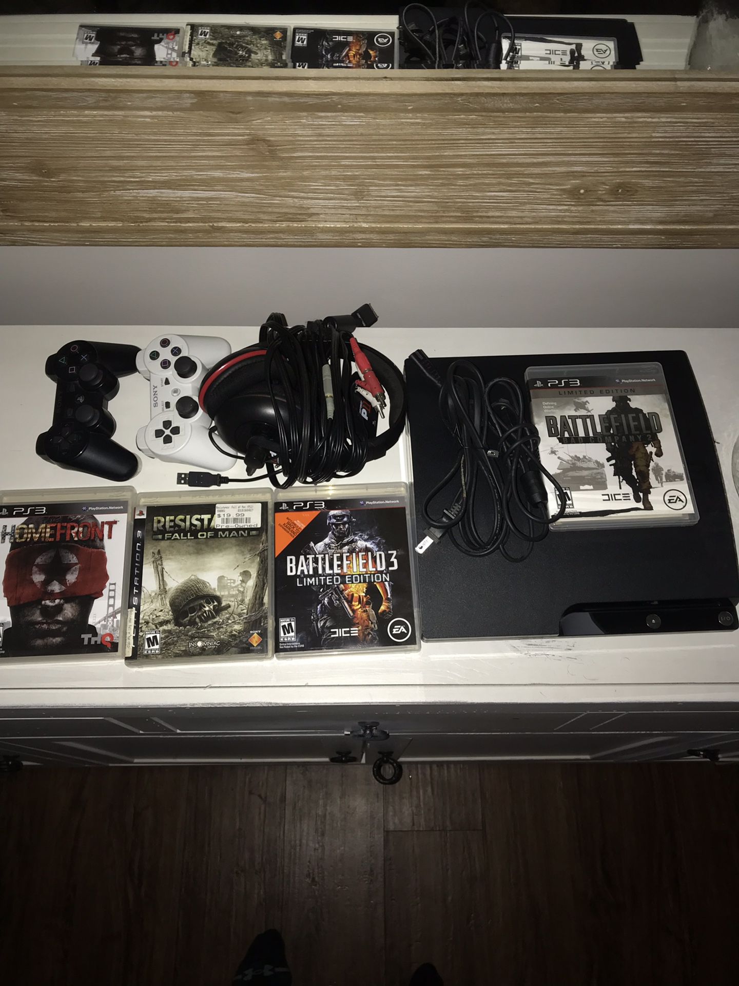 Ps3 with 4 games, 2 controllers, headset.