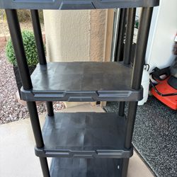 This product is a Project Source or similar 4-Tier Plastic Utility Shelving Unit.  Dimensions: Approximately 14.25” D x 22” W x 47” H. Capacity: Holds