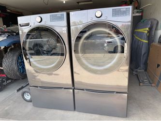 LG front loaders washer/dryer with pedastals