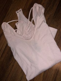 Super cute baby pink bodysuit shirt.