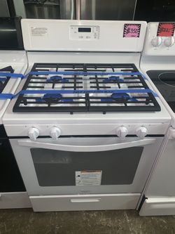 New Whirlpool white gas range with 6 months warranty