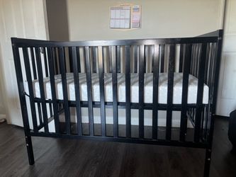 Brown wood crib with/without mattress