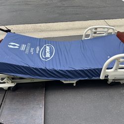 Invacare hospital bed, specifically appearing to be from the CS series