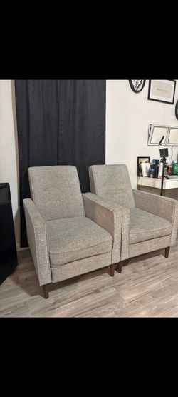 Light gray reclining chairs