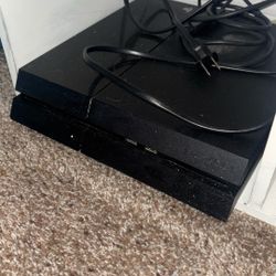 PS4 and controller and games