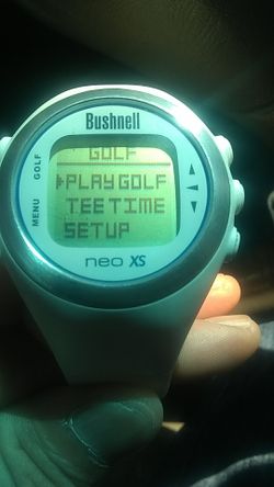 Golf gps watch and charger.