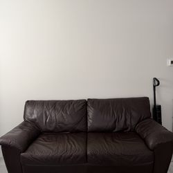 Brown leather couch/sofa
