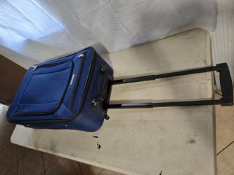 Semi- new mini suit case 24" high x 7" wide x 16" long 