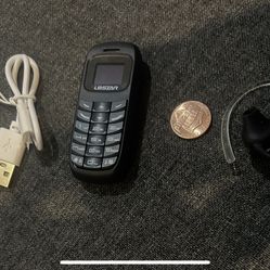 “New”Worlds Smallest Cellphone “Bluetooth Dialer, Phone Book,”Headset,talking Text, Mic,music Alarm Clock