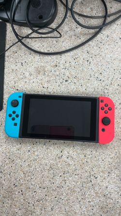 NINTENDO SWITCH WITH CARRYING CASE AND CHARGER