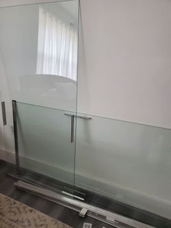 Shower Door with Chrome Hardware 62x31 each door