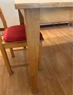 36x48 Solid Oak Table. Seats 4-6 comfortably. Legs removable for easy storage/moving. Two chairs.