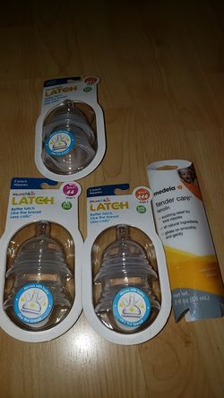 Brand new baby bottle nipples and breast cream