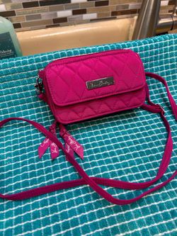 Vera Bradley crossbody purse in magenta. 6” x 3.75” in like new condition.