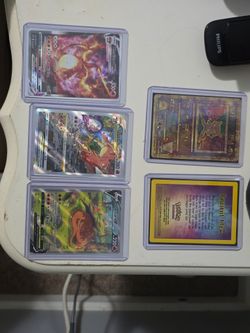 Mint condition 2000s ancient mew promo. Mint condition 21 sw&sh Charizard  V, VMax, VStar.