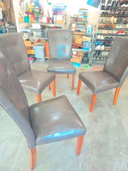 Leather dinning table chairs