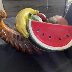 ceramic fruit in a loom