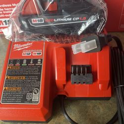 MILWAUKEE M18  SMALL BATTERY 2.0 And CHARGER  BRAND  NEW  Out  The Box Never Used  ((  Picture Is Not  Actual Tool )) 