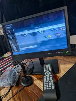 New 14" led tv & DVD player (incl car adapter for camping etc)