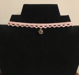Pink lace choker necklace with golden charm