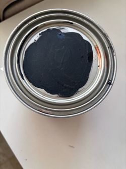 Black Paint in Metal Can