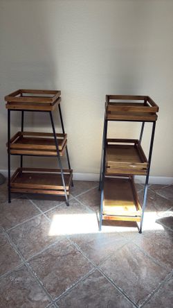 2 Wood and metal shelves $30.00 each