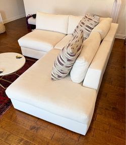 White modular sofa Living Spaces