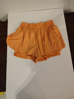 Butterfly short, orange, girls, she in, M