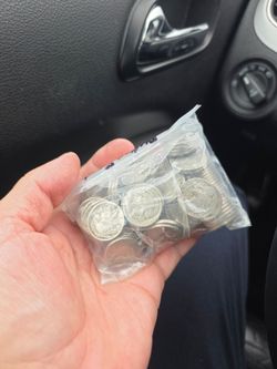 100 Buffalo Nickles different dates.