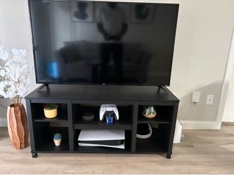 Tv stand up to “55”