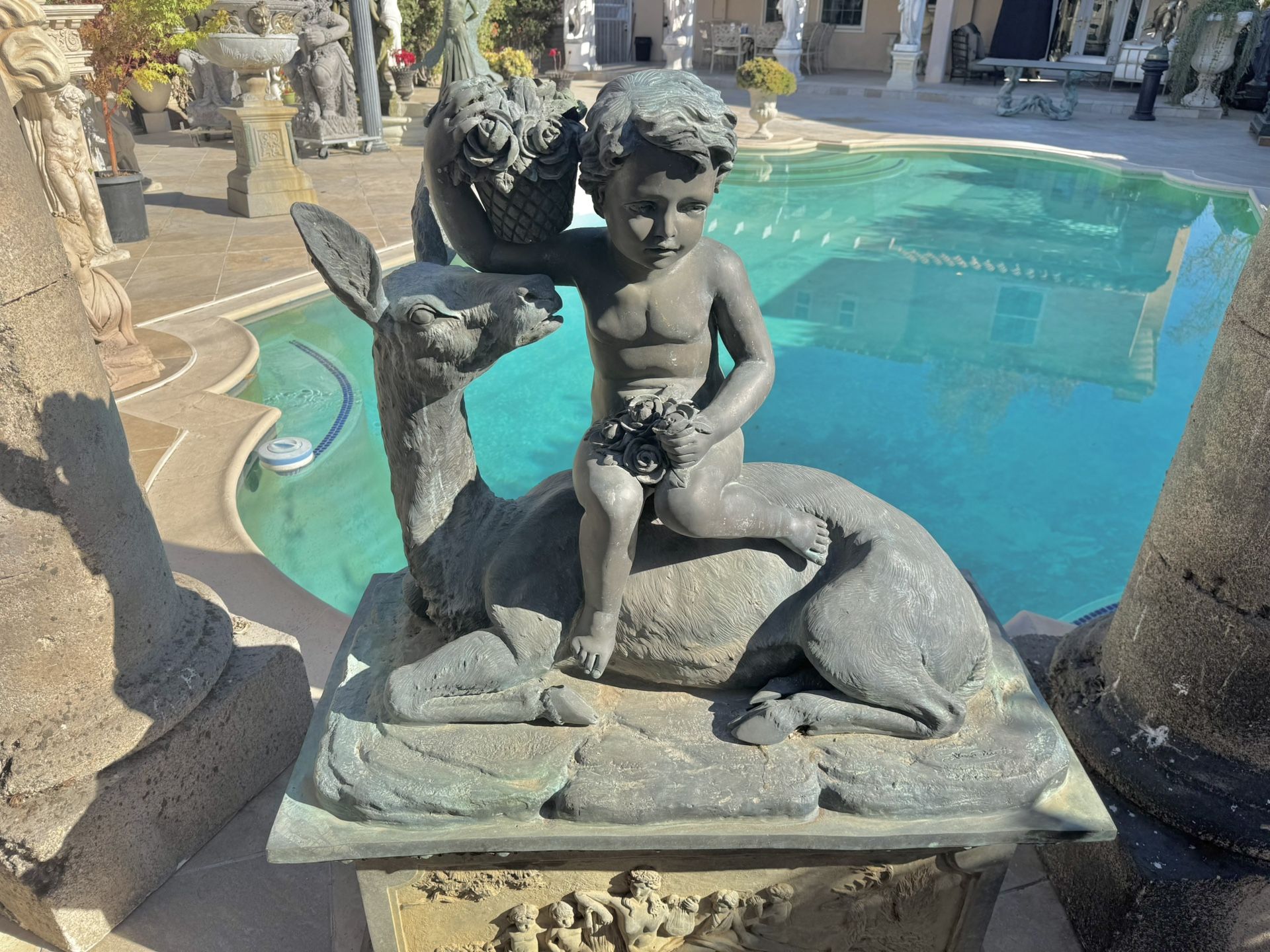 Large Garden Bronze Sculpture of a Boy with roses, sitting on Deer and Pedestal Signed