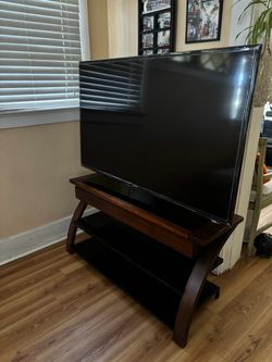 Samsung Flat Screen TV with Wood and Glass TV Stand