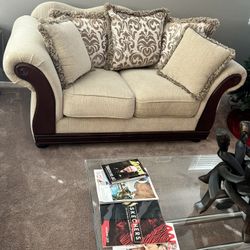 Living Room Love Seat, and One end table.