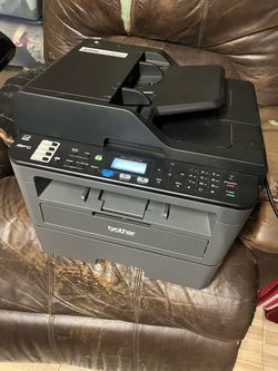 The Brother MFC-L2710DW is a highly popular, monochrome (black and white) all-in-one laser printer that can print, scan, copy, and fax.  (60% toner. /