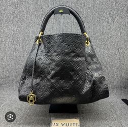 Authentic Louis Vuitton Artsy mm Black, Gold, leather Monogram Embossed Handbag