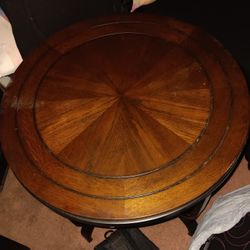 Round Coffee table and 2 end tables.
