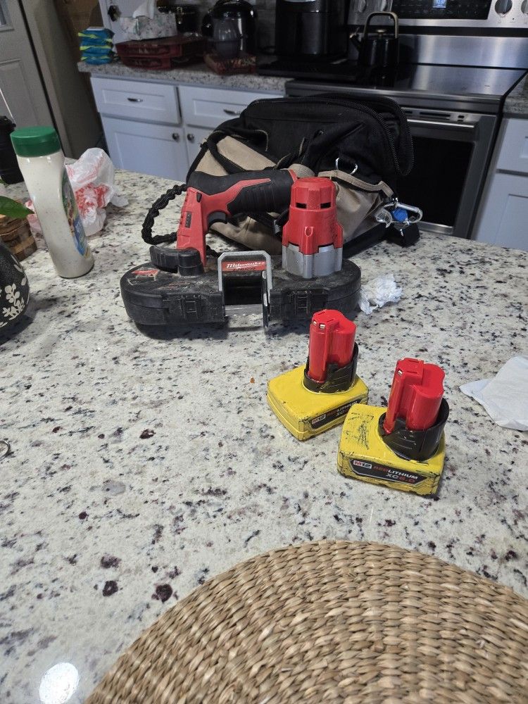 Mini Milwaukee Bandsaw And 2 - M12 XC 6.0 Batteries 
