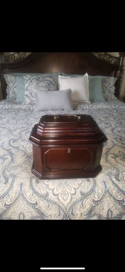 Wooden jewelry box.