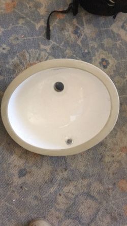 Under mount porcelain sink