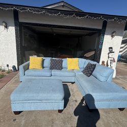 Sectional couch with otoman,can deliver