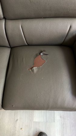 Leather love seat needs love