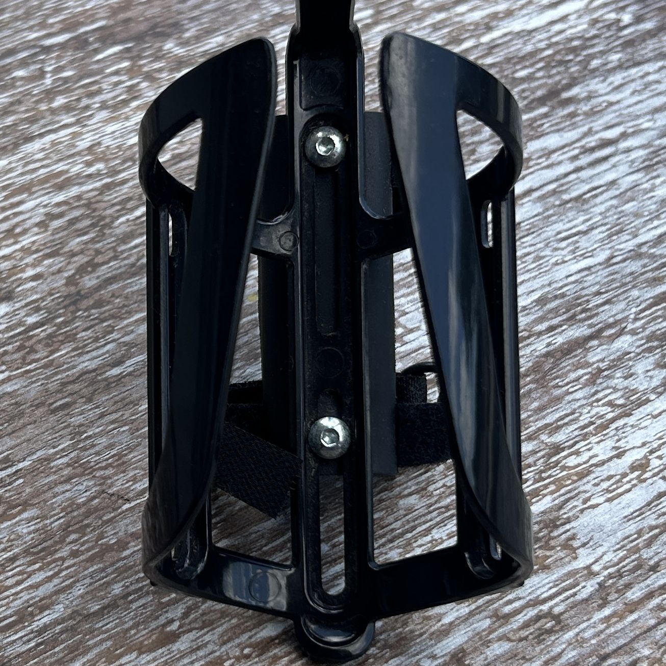 Bottle cage with straps for bicycle