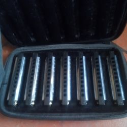 $40 Hohner 7 Key Harmonica W/Case
