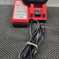Milwaukee  Battery  And  Charger 