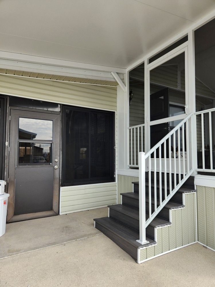MANUFACTURED HOME AND PERIMETER LOT IN HOLIDAY CONDO PARK (16410 SAN CARLOS BLVD.)