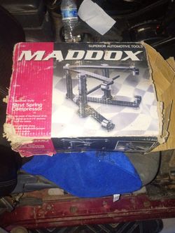 Used one time strut spring compressor made by Maddox