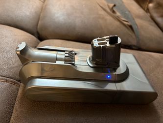 Dyson outsize battery and charger