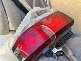 passenger-side (right-hand) rear tail light